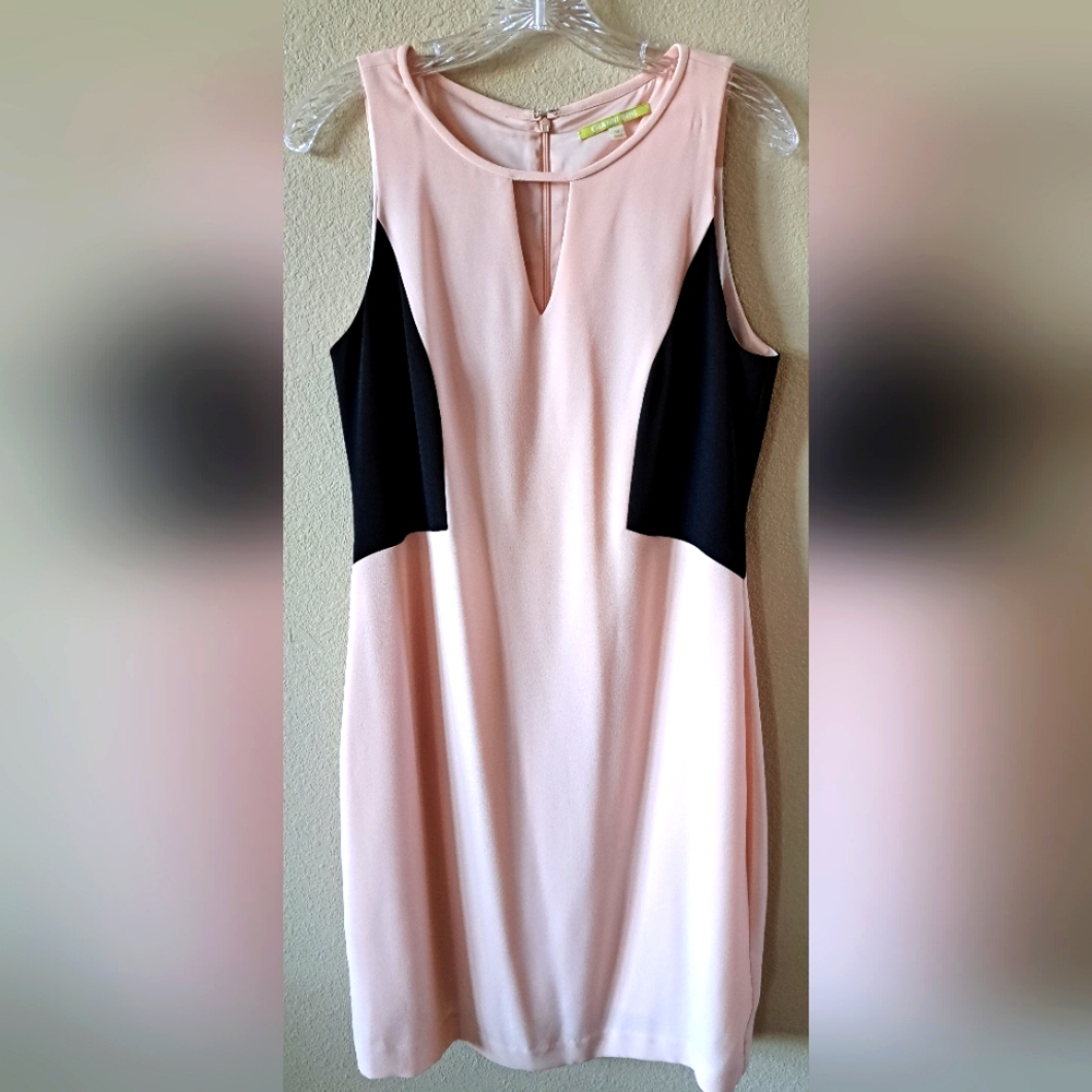 Gianni Bini light peach dress with black     on the sides. Size 10, pre-owned